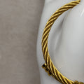 Pulsera rígida corchada gruesa